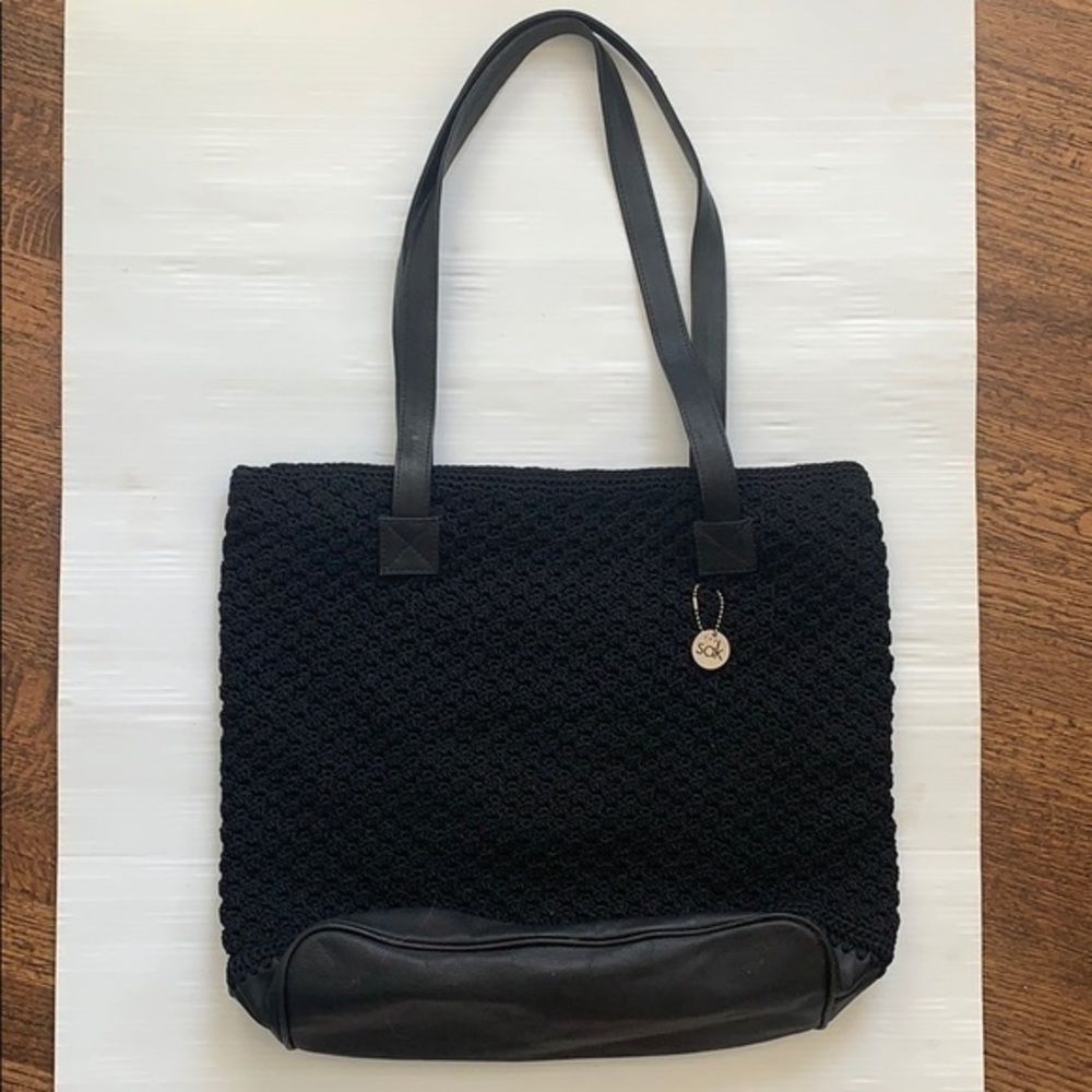 The Sak black macrame crochet purse.